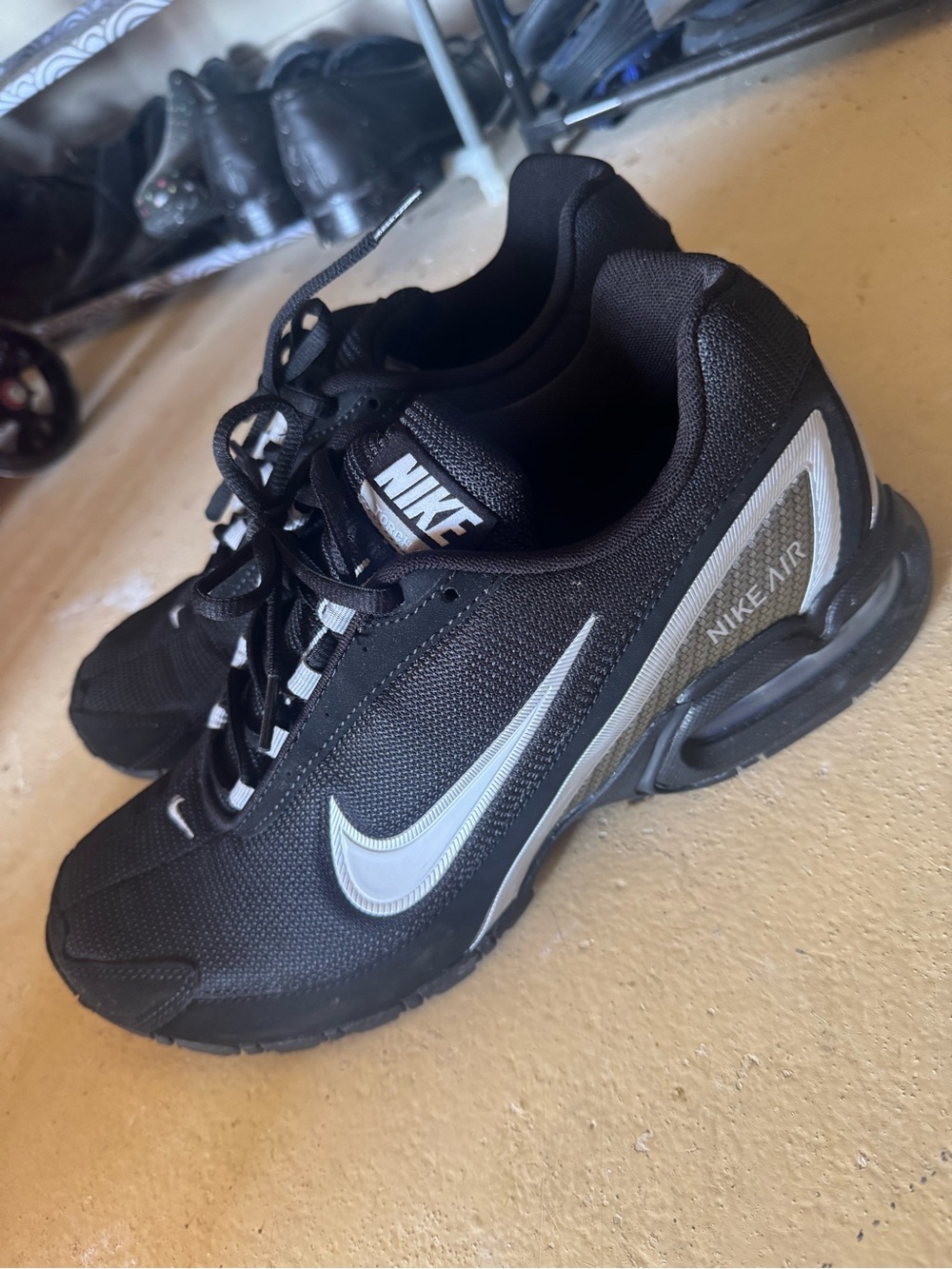 Nike Men’s Black Sneakers with Silver Swoosh